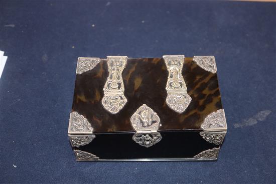 A 19th century white metal mounted tortoiseshell travelling writing set casket and a white metal mounted tortoiseshell box.